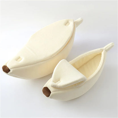 Banana-shaped slippers on a white background